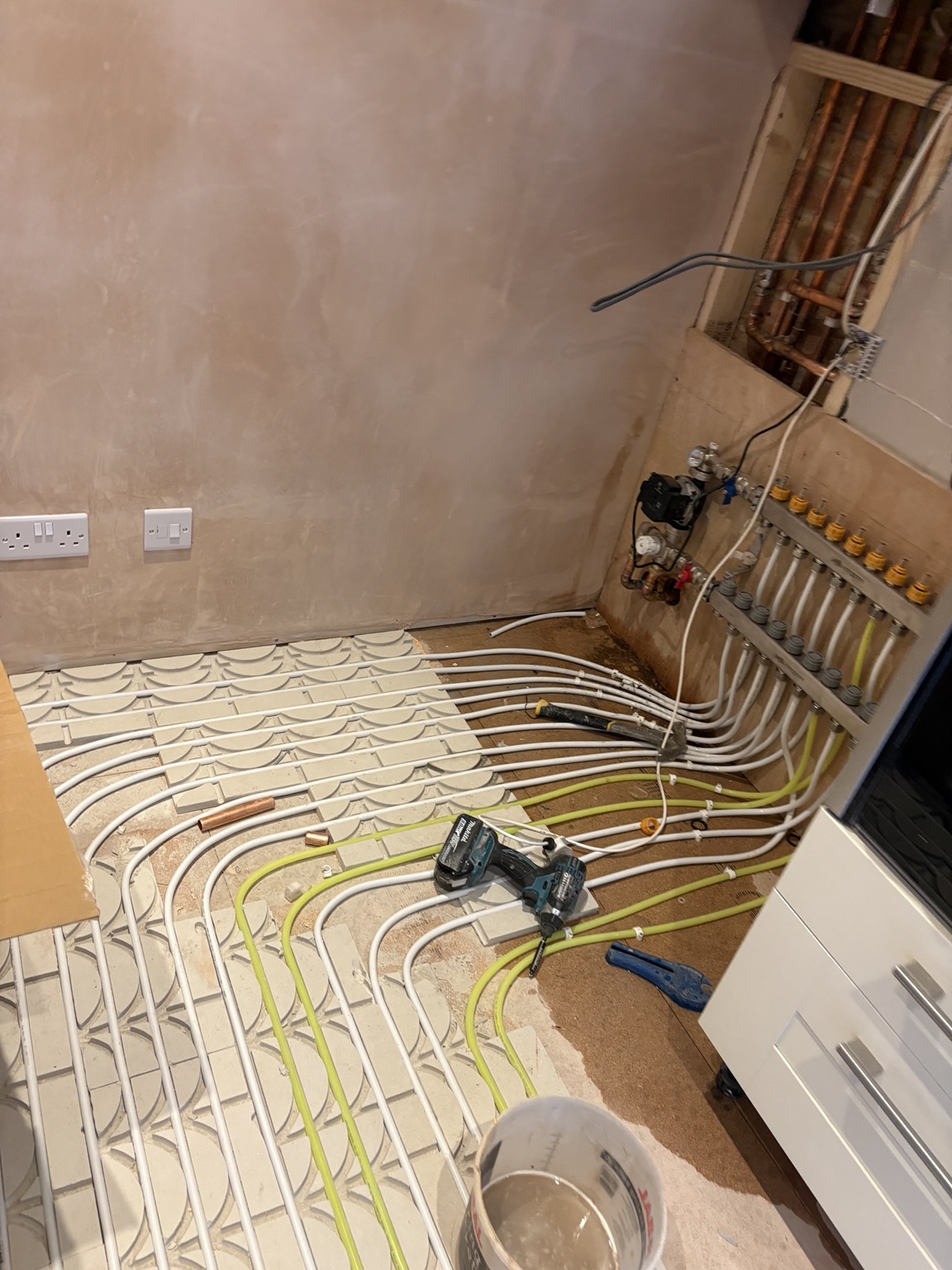 Underfloor heating manifold and pipework